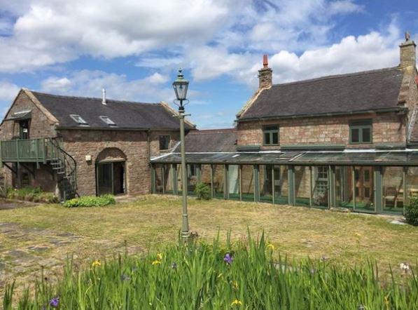  On the market for just under £900,000 is this countryside farmhouse