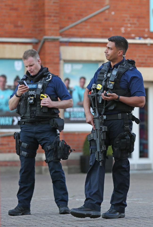  Armed cops surrounded the ground as fans were evacuated