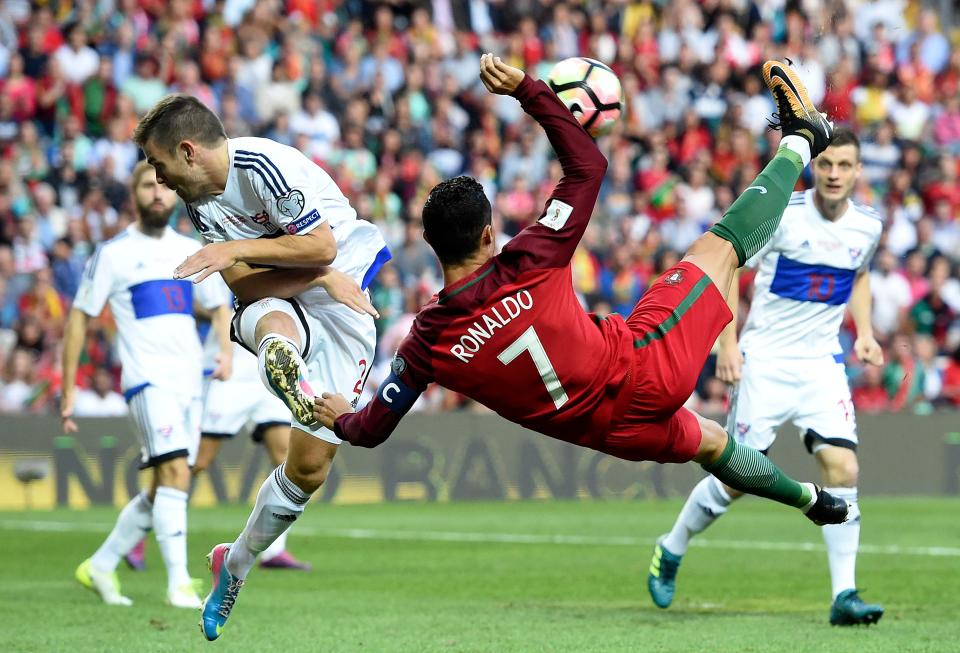  Cristiano Ronaldo scored his 12th, 13th and 14th World Cup qualifying goal