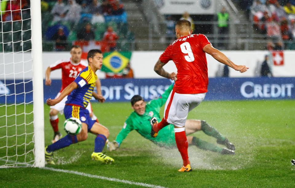  Andorra's goalkeeper slipped over as Switzerland scored their second goal