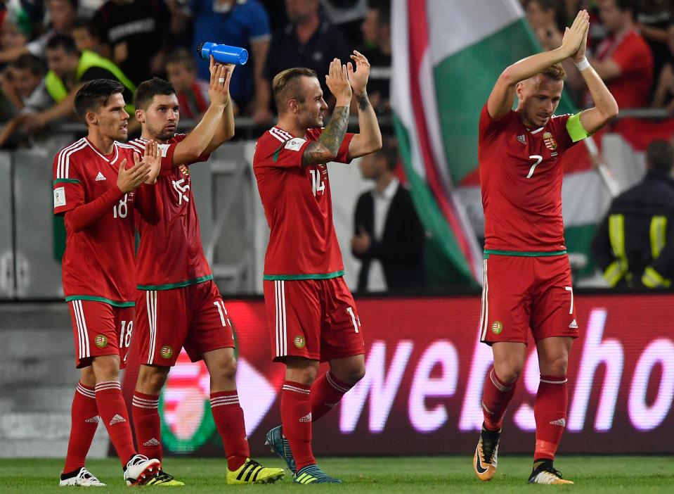  Hungary remain in the World Cup hunt with a 3-1 win over Latvia