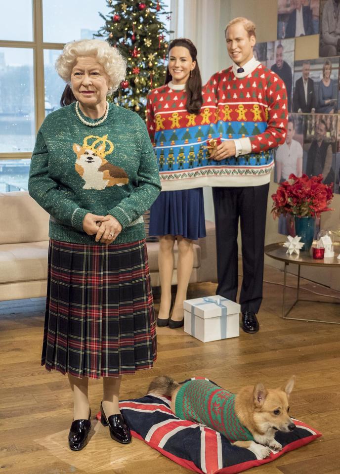  One of Layla's dogs with Madame Tussauds waxworks of the royals