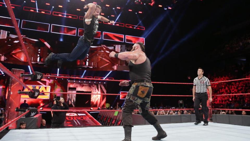  Dean Amrbose leaps at Braun Strowman