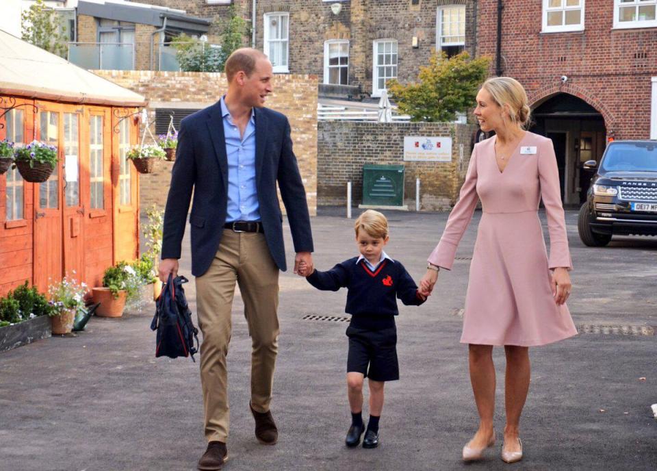  Prince George was escorted to his first day of school today by his dad, the Duke of Cambridge. They are pictured above with Helen Haslem, head of lower school at Thomas's