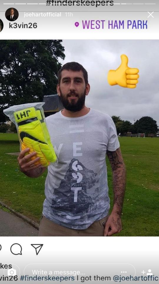  One lucky fan poses with the gloves he found for Joe Hart's competition