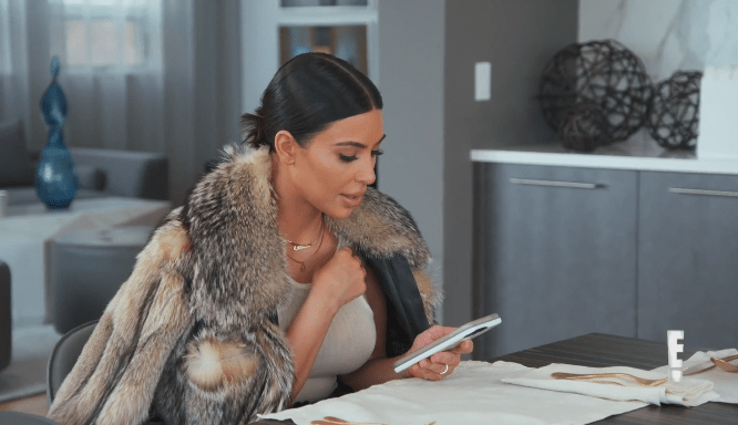  Kim gets a text with an extract from Caitlyn's book