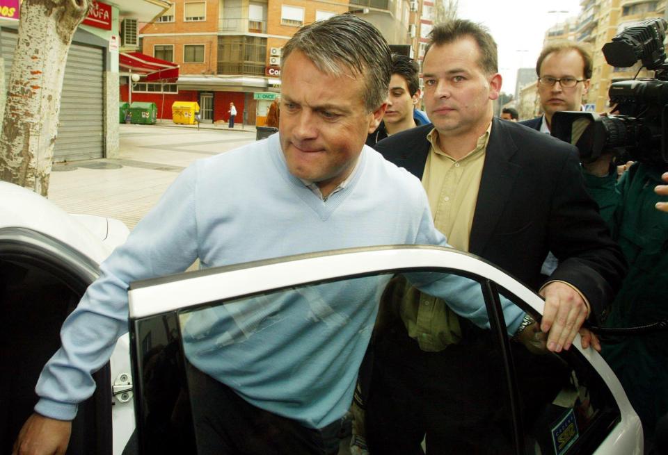  Leicester City manger Micky Adams (left) and Chief Executive Tim Davies leave court after a farcical attempt to find their car with the press pack in tow