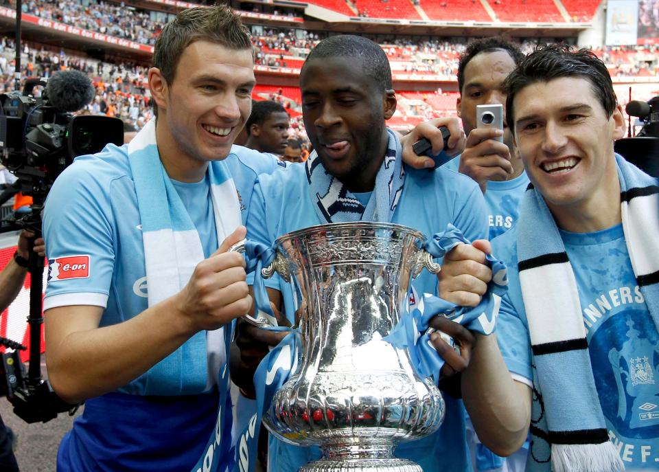  Barry, right, went on to join Man City and won the FA Cup and the Premier League with them