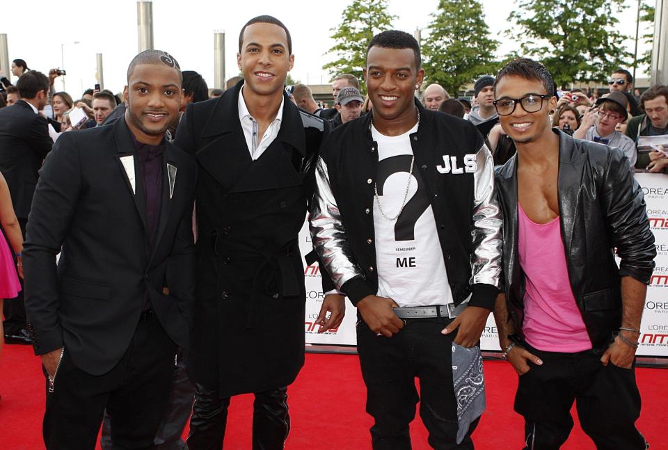 Aston Merrygold with JLS member Jonathan 'JB' Gill, Marvin Humes and Oritse Williams at the 2011 National Movie Awards at Wembley Arena, London