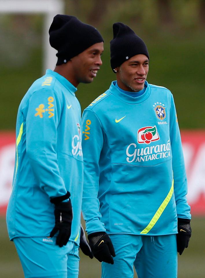  Neymar and Ronaldinho share a laugh in Brazil training a few years ago