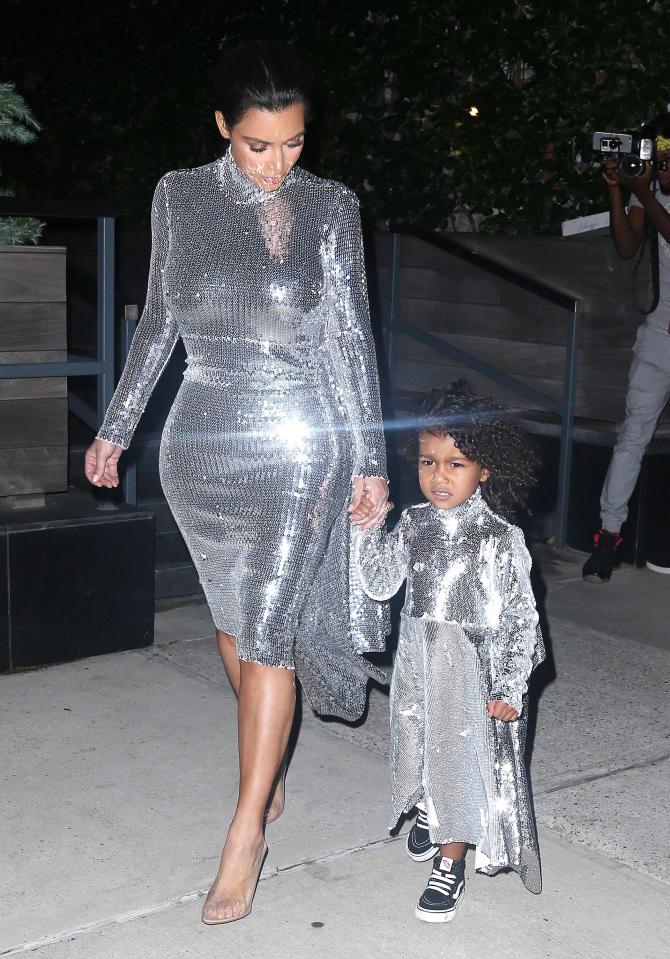  Kim Kardashian and North West match in a sparkly number - only their shoes are different