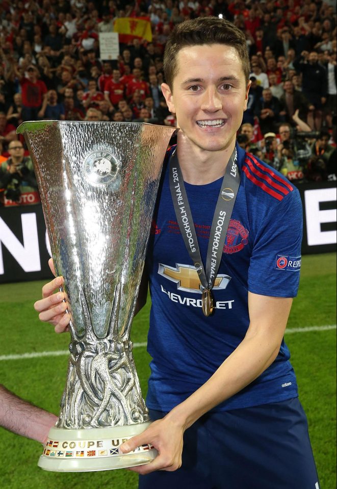  Herrera celebrates with the Europa League trophy after a match against Ajax