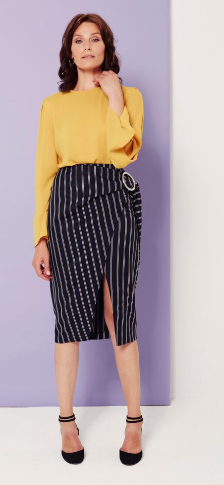  Mustard blouse, £35.99, Mango; striped pencil skirt, £38, Asos.com; black heels with straps, £55, Office; silver earrings, £8, Debenhams