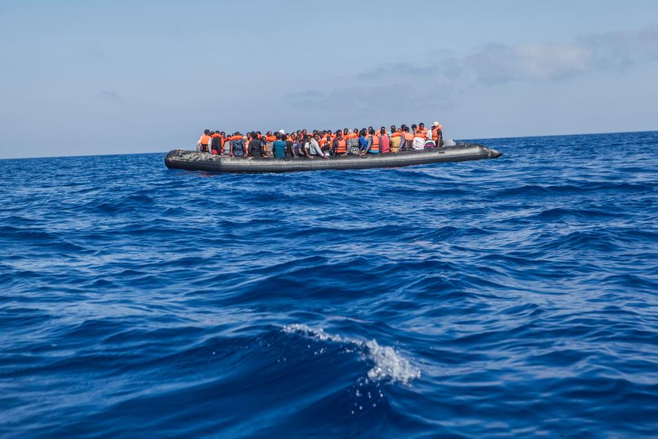  A rubber boat with 129 migrants on board sailing out of control about 15 miles north of Al Khums, Libya, in August