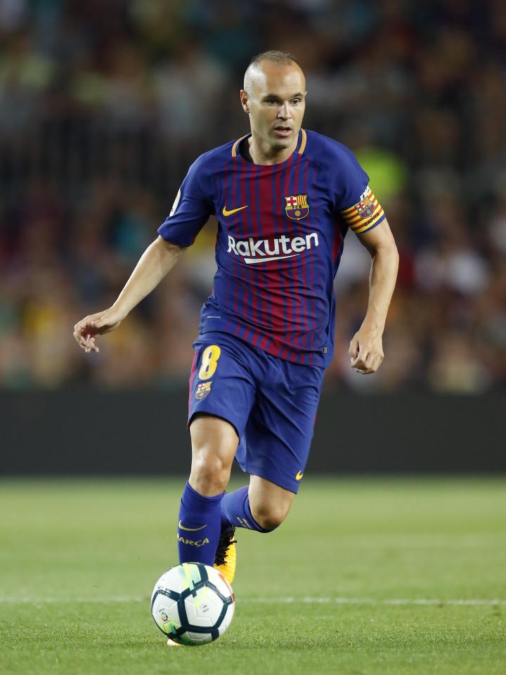  Andres Iniesta looks set to stay at the club he has played for all his life