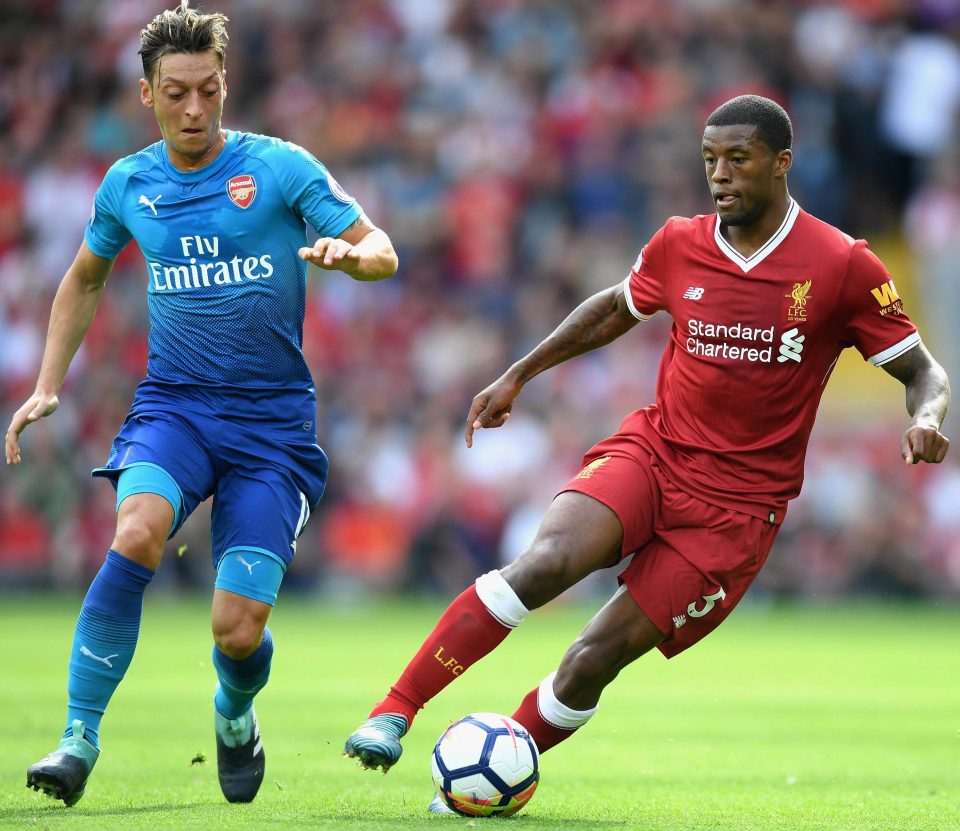  Mesut Ozil in pursuit of Georginio Wijnaldum at the Emirates last season