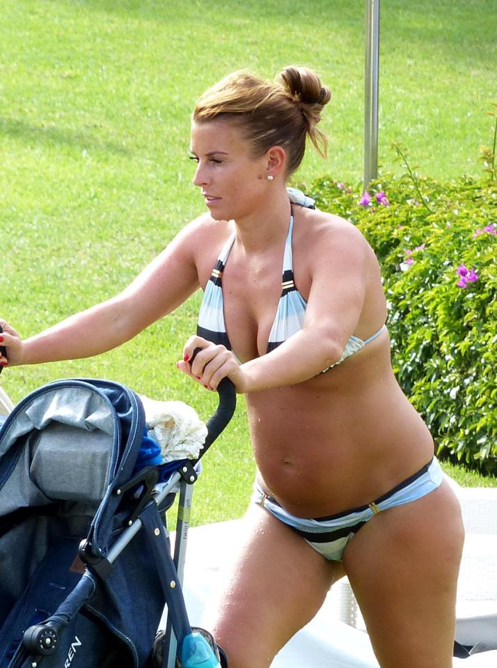  Pregnant Coleen Rooney showed off her growing baby bump in a bikini while on holiday in Majorca