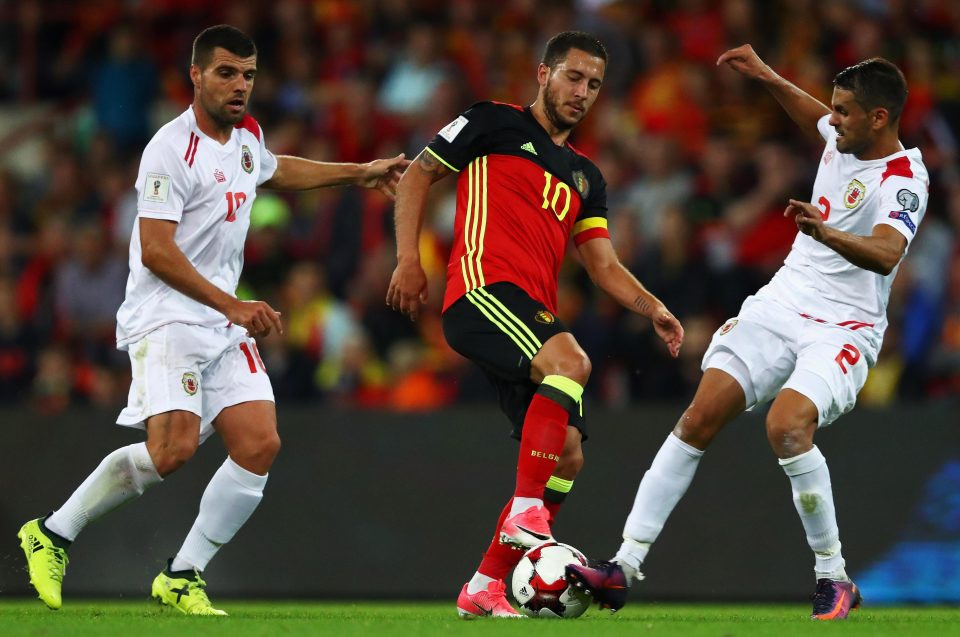  Midfielder Eden Hazard came on for Belgium in the victory against Greece - but Cesc Fabregas did not even get into the Spain squad