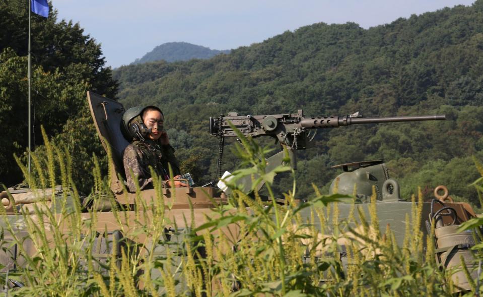  A South Korean army soldier mans a K-9 self-propelled howitzer as he prepares for a military exercise in Paju, South Korea, near the border with North Korea