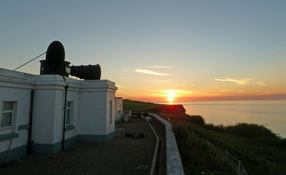  The house has two enormous 20 foot long and eight foot high foghorns on the roof, visible above