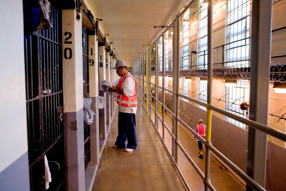  Inmate Jose Meza delivers clean sheets to cells inside Folsom Prison