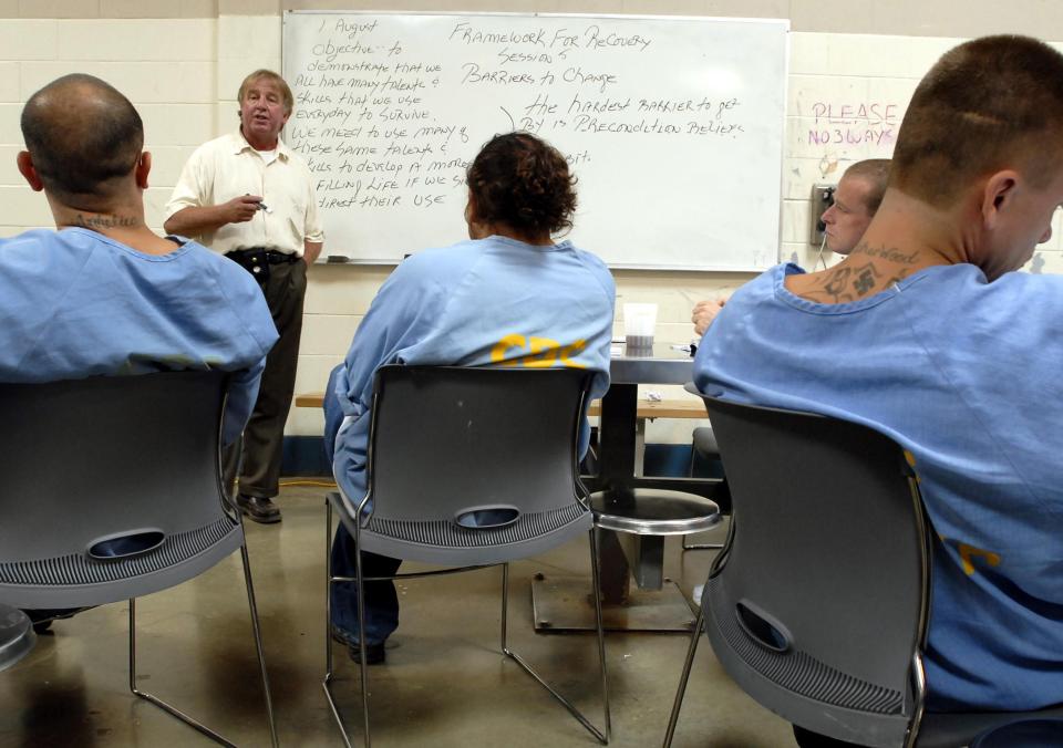  Mentor Bob Trefcer leads a class in substance abuse awareness at the Parole Transitional Treatment Facility in Folsom