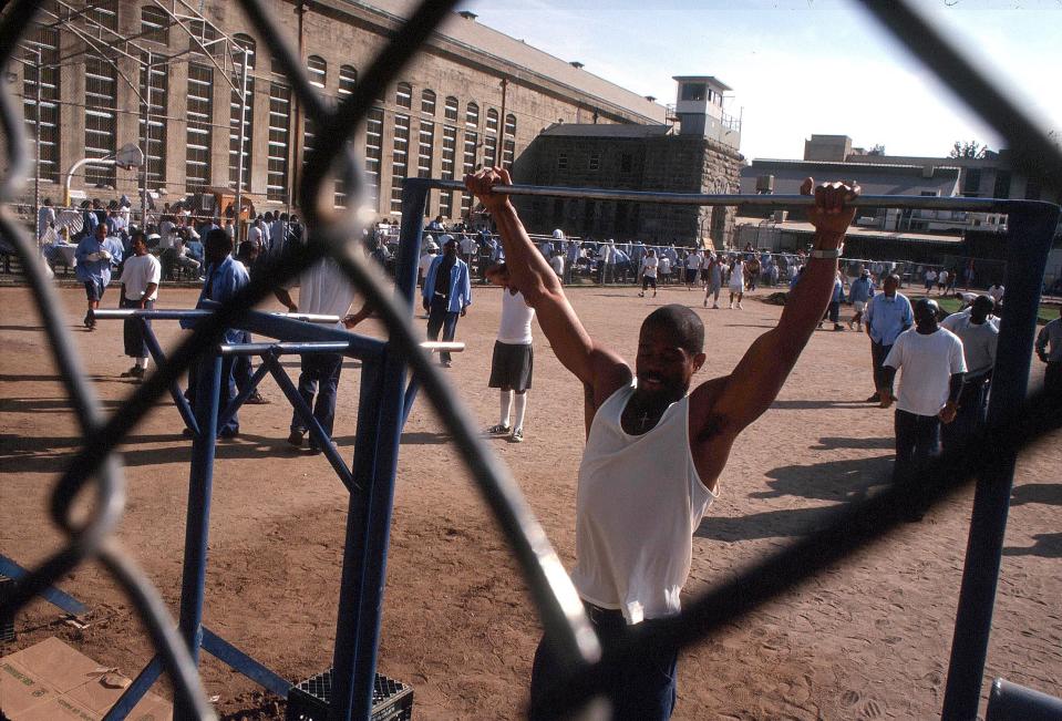  Prisoners exercise in the famous Folsom Prison yard