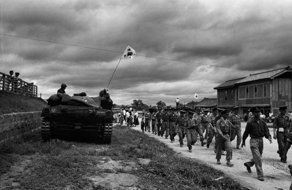 An American tank on the move with South Korean troops during the conflict which lasted for three years in the 1950s