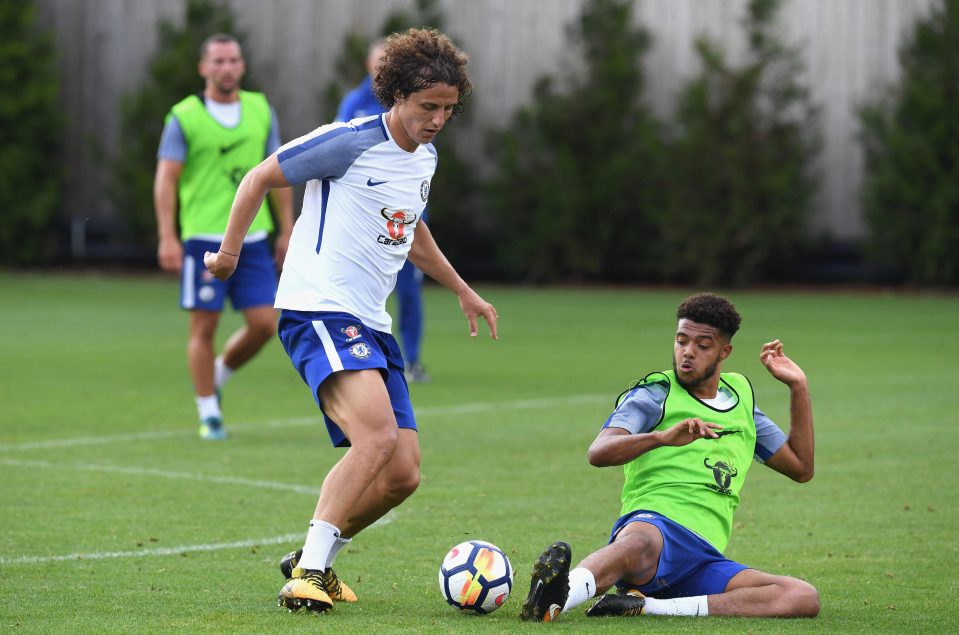  David Luiz takes on Jake Clarke-Salter during the training session at Cobham