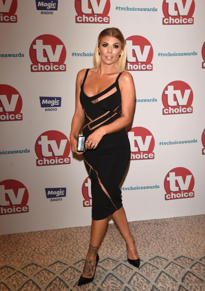  Olivia Buckland wore a black dress with cut-out panels