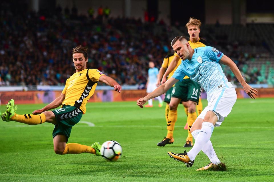  Double goalscorer Josip Ilicic vies with Lithuania's Valdemar Borovskij