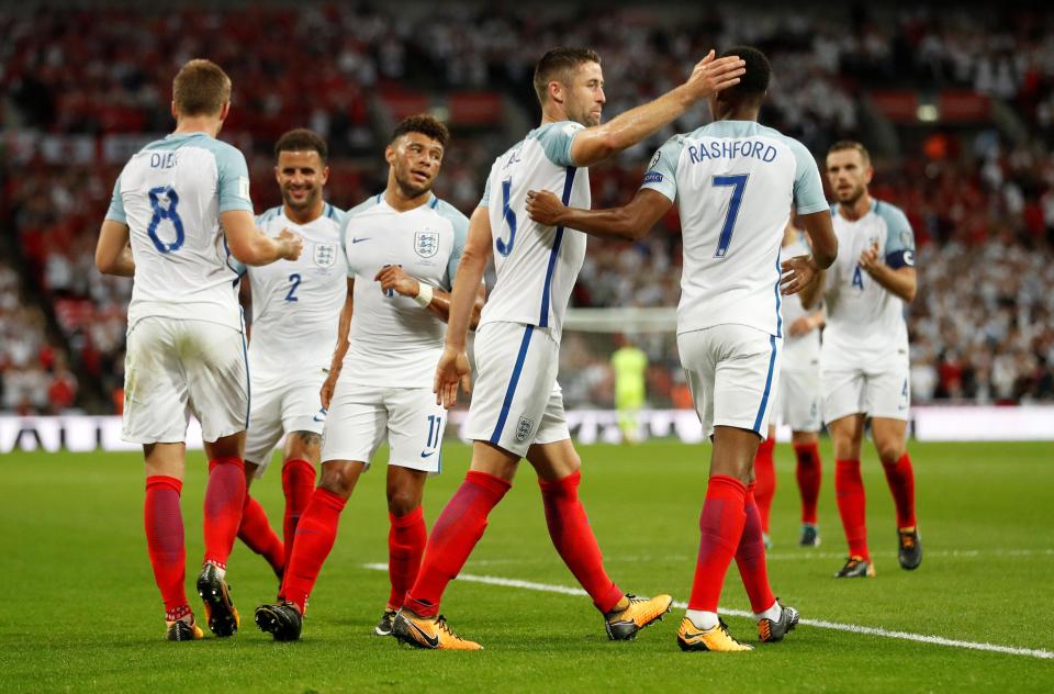  Gareth Southgate's men celebrate after Eric Dier scored against Slovakia