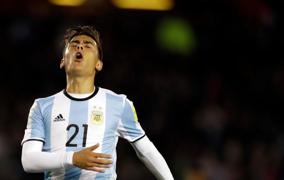  Paulo Dybala winces after missing a chance against Venezuela