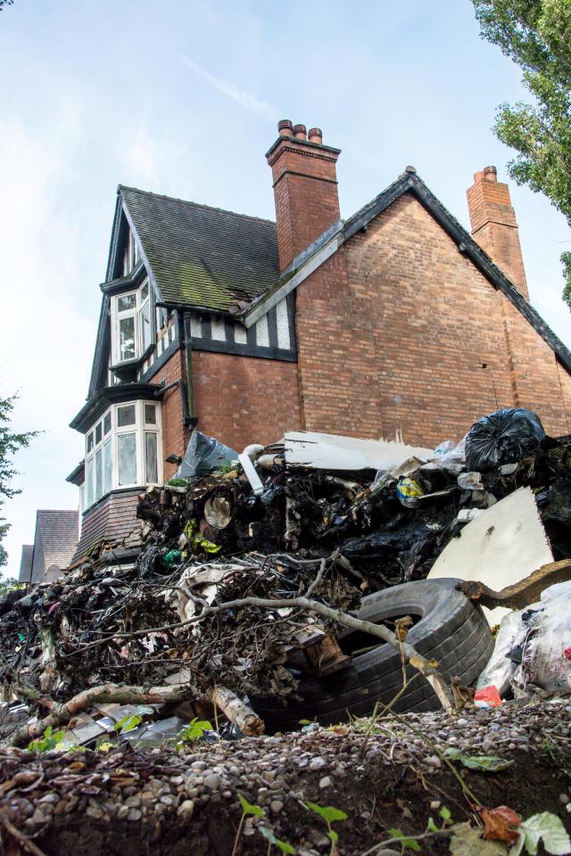  The driveway of a Birmingham home has been turned into a makeshift tip after tons of rubbish were dumped there