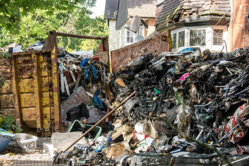  The mountain of waste includes black bin bags, car parts and tyres