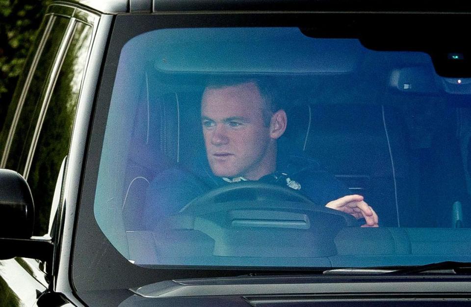  Everton forward Wayne Rooney turned up to training for the first time since his arrest