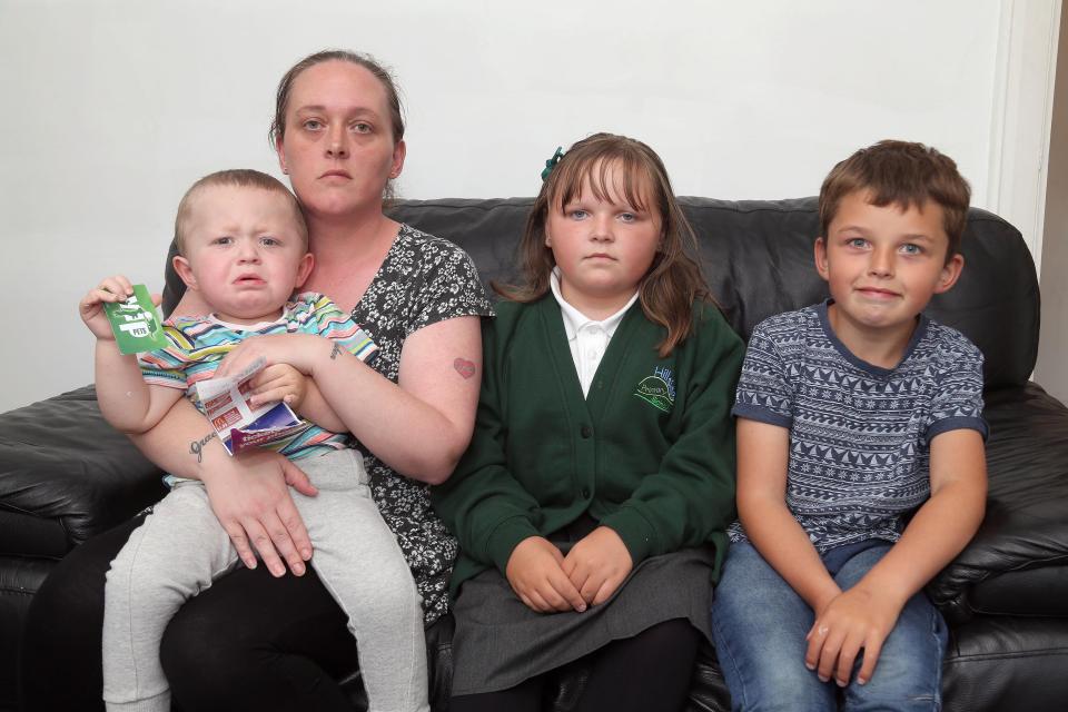  Melanie Milloy, pictured with her children Harrison, Grace and Reuben, says she faces an impossible task trying to get her three children to school after moving house