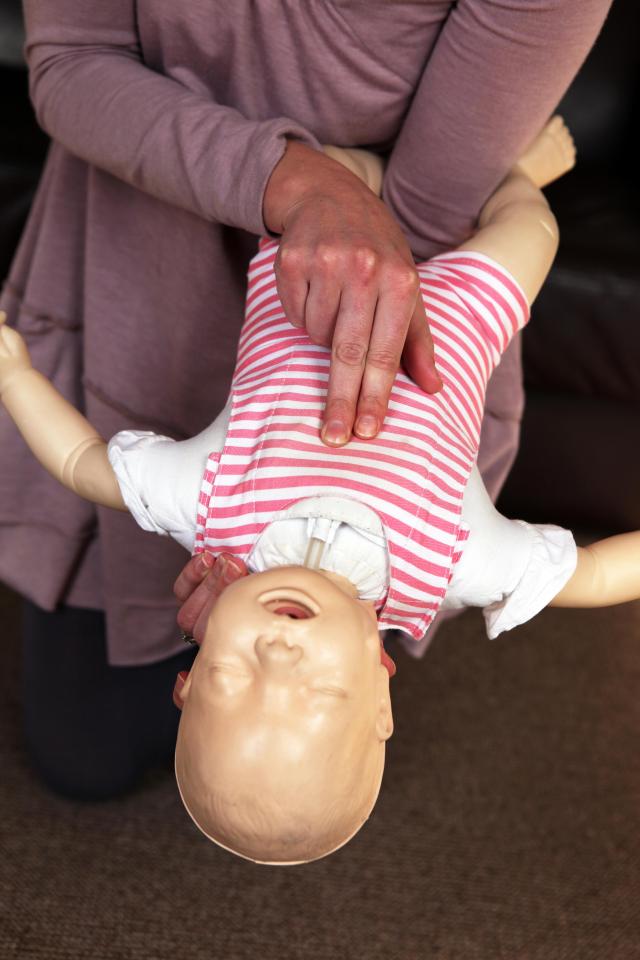  If back blows don't dislodge the object, turn your baby over and place two fingers in the middle of their chest to give them five chest thrusts