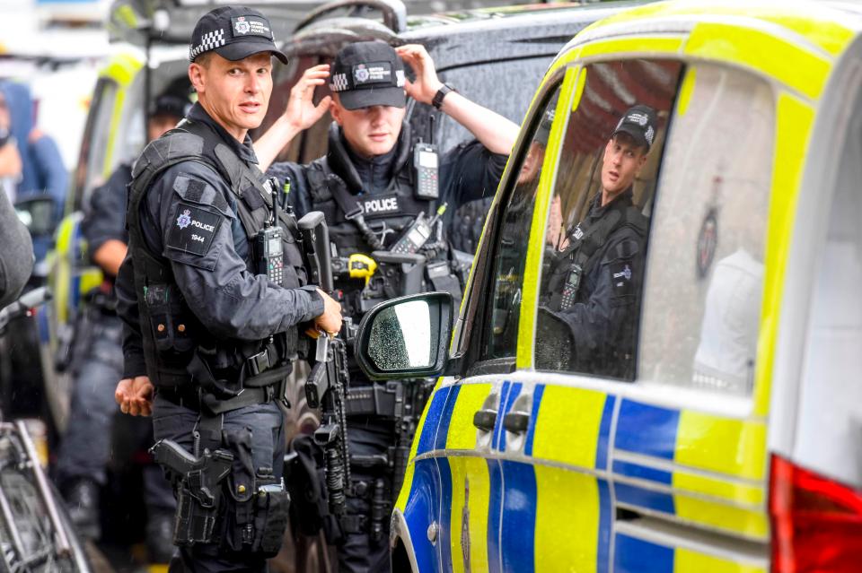  Armed cops have formed a ring of steel around the arena ahead of tonight's concert