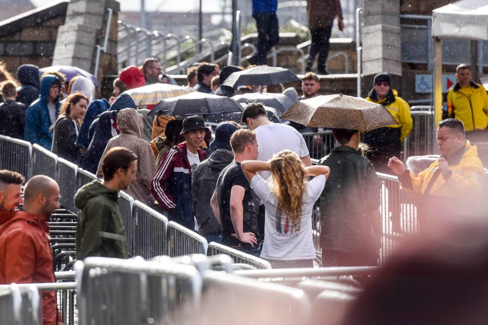  There have been emotional scenes as concertgoers joined huge queues outside Manchester Arena