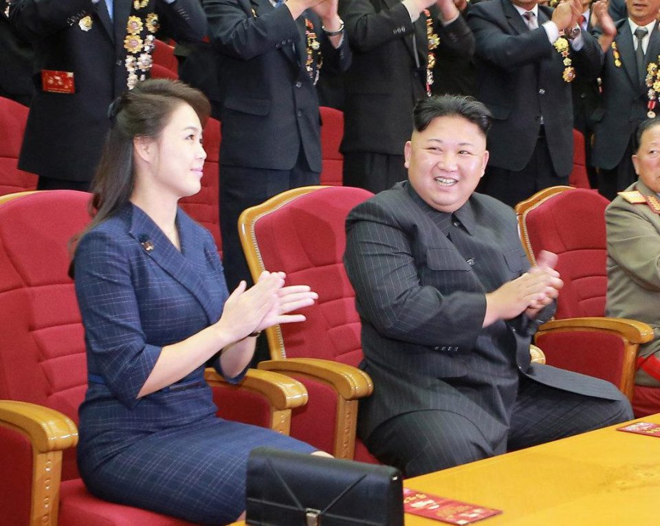  The North Korean dictatror claps during a celebration for nuclear scientists and engineers who contributed to a hydrogen bomb test