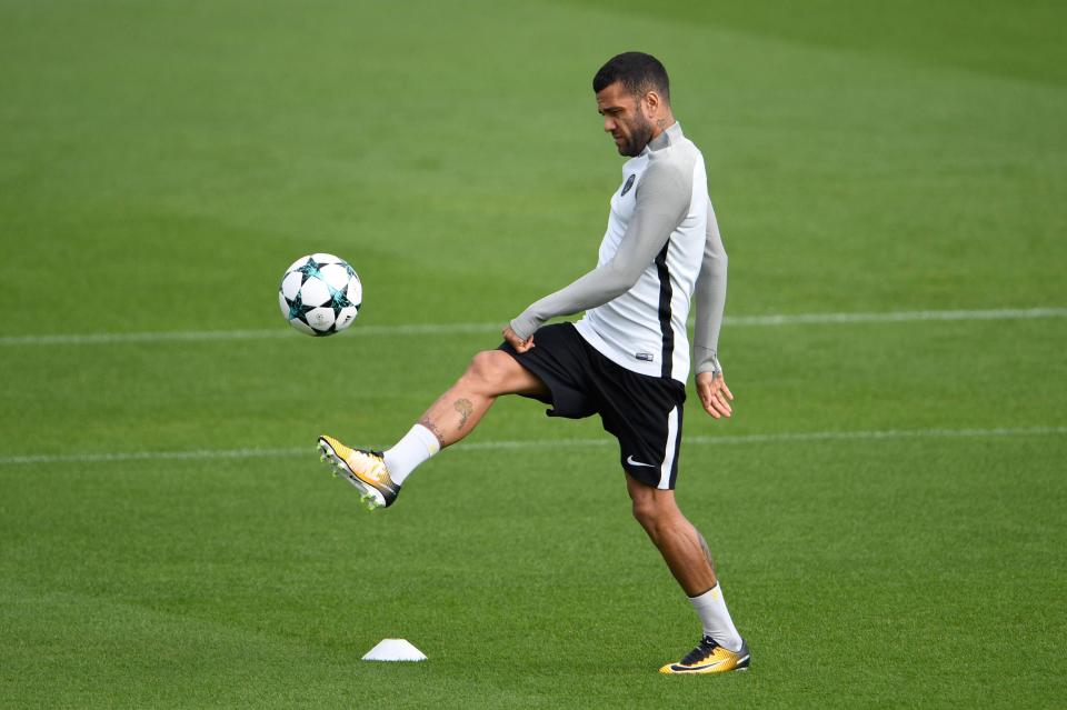  Former Barcelona ace Dani Alves keeps the ball up in training