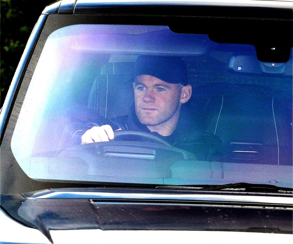  Rooney picture arriving for training last week after his arrest