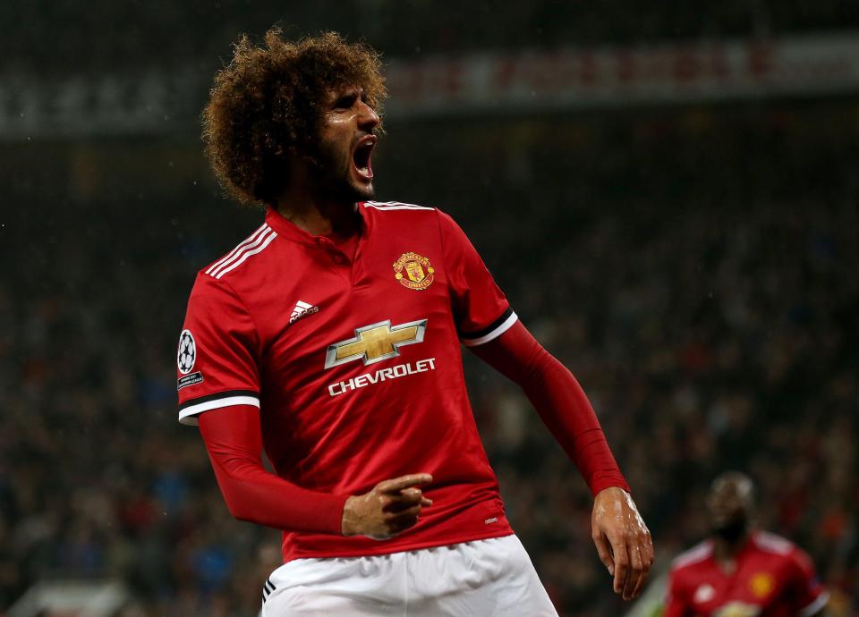  Marouane Fellaini fired them ahead shortly before the break