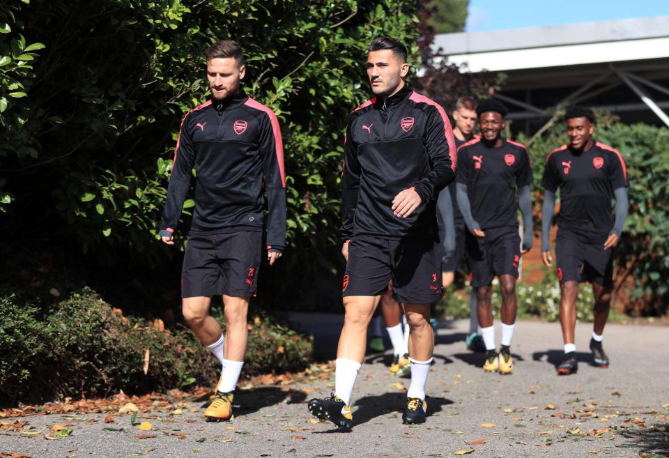  Former Bundesliga duo Mustafi and Kolasinac stroll out ahead of the Cologne test