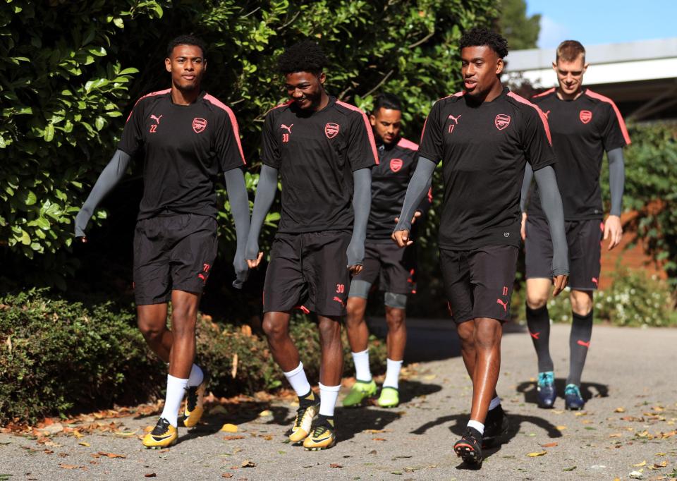  Alex Iwobi, right, was among the men required for training on Wednesday