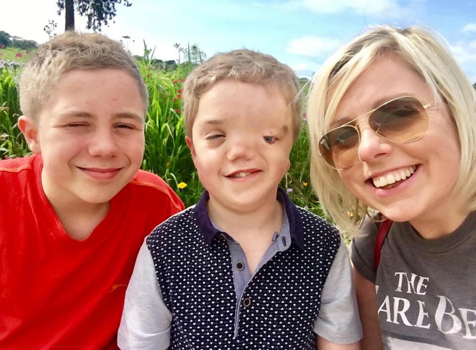  Mum Charlie Beswick, 38, with twins Harry Beswick (centre) and Oliver Beswick, 12