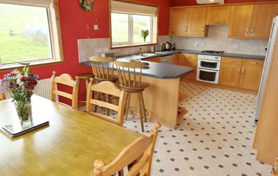  The bright kitchen in the four-bed home which is also included in the sale