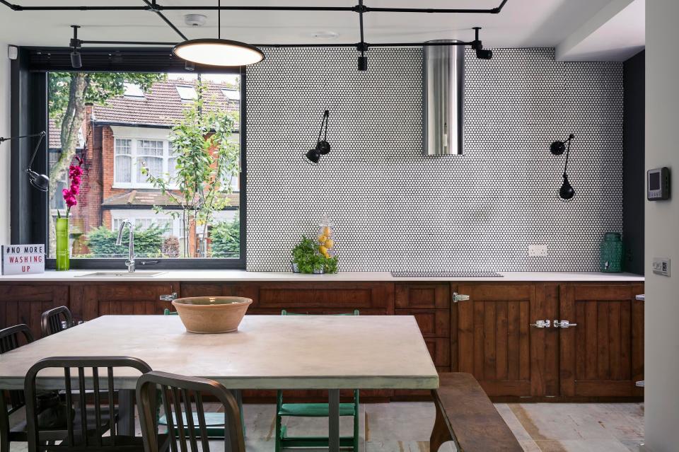 The kitchen pays homage to Mark's love of more traditional furnishings