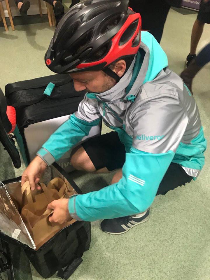  Delivery of his double cheeseburger and chips from the Deliveroo rider